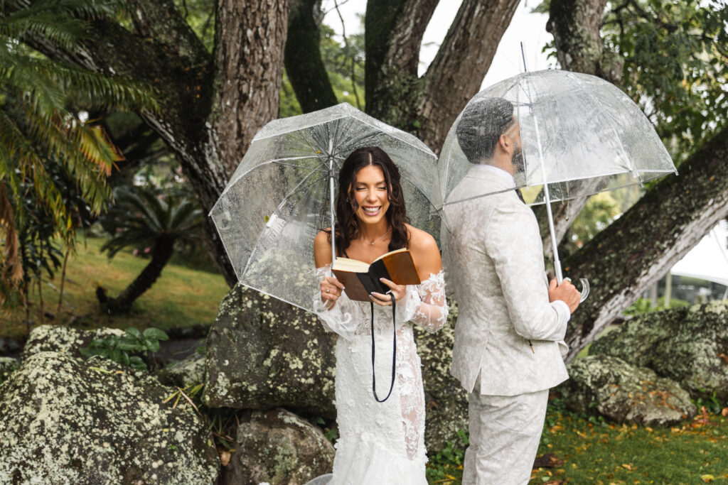 Rainy first touch at Kualoa Ranch wedding